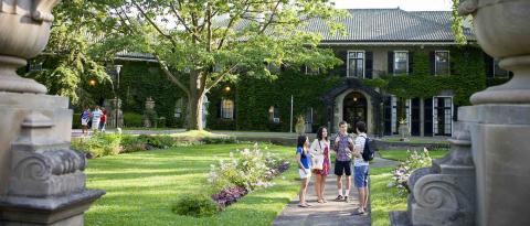 Students standing in front of Leslie Frost library (Glendon)